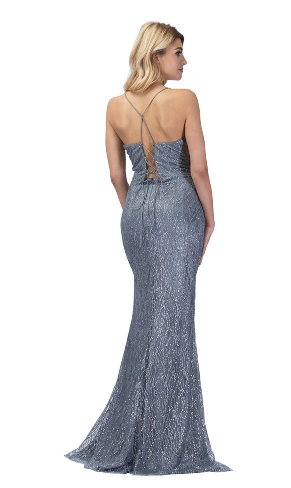 A woman is wearing the Corset-Back Glitter-Print Long Prom Dress 4023—a floor-length, silver-gray gown with a lace-up back and thin crisscross straps—standing facing away.